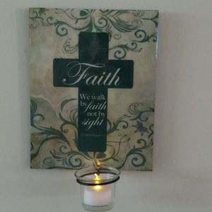 Wall plaque with candle holder